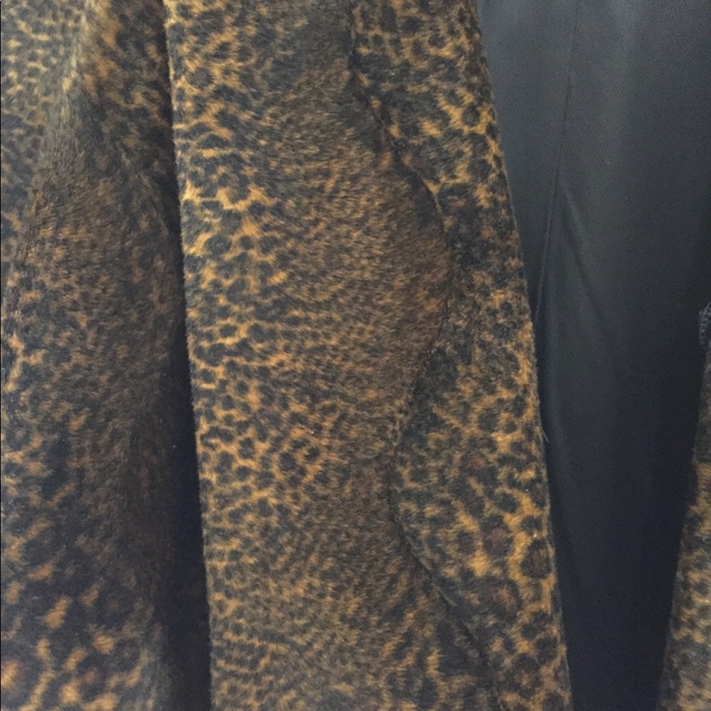 Three-quarter length coat. 38” length